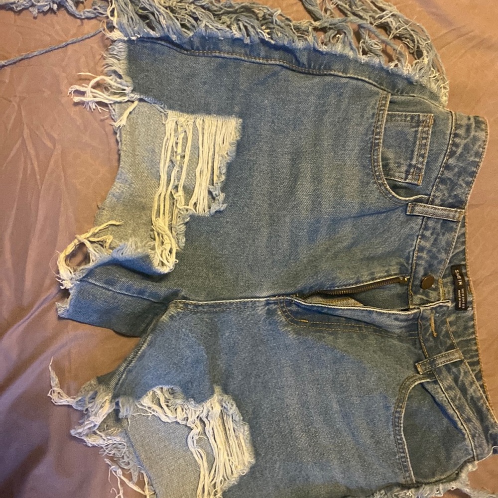 Denim Shein Shorts with flared sides. Slightly distressed pockets